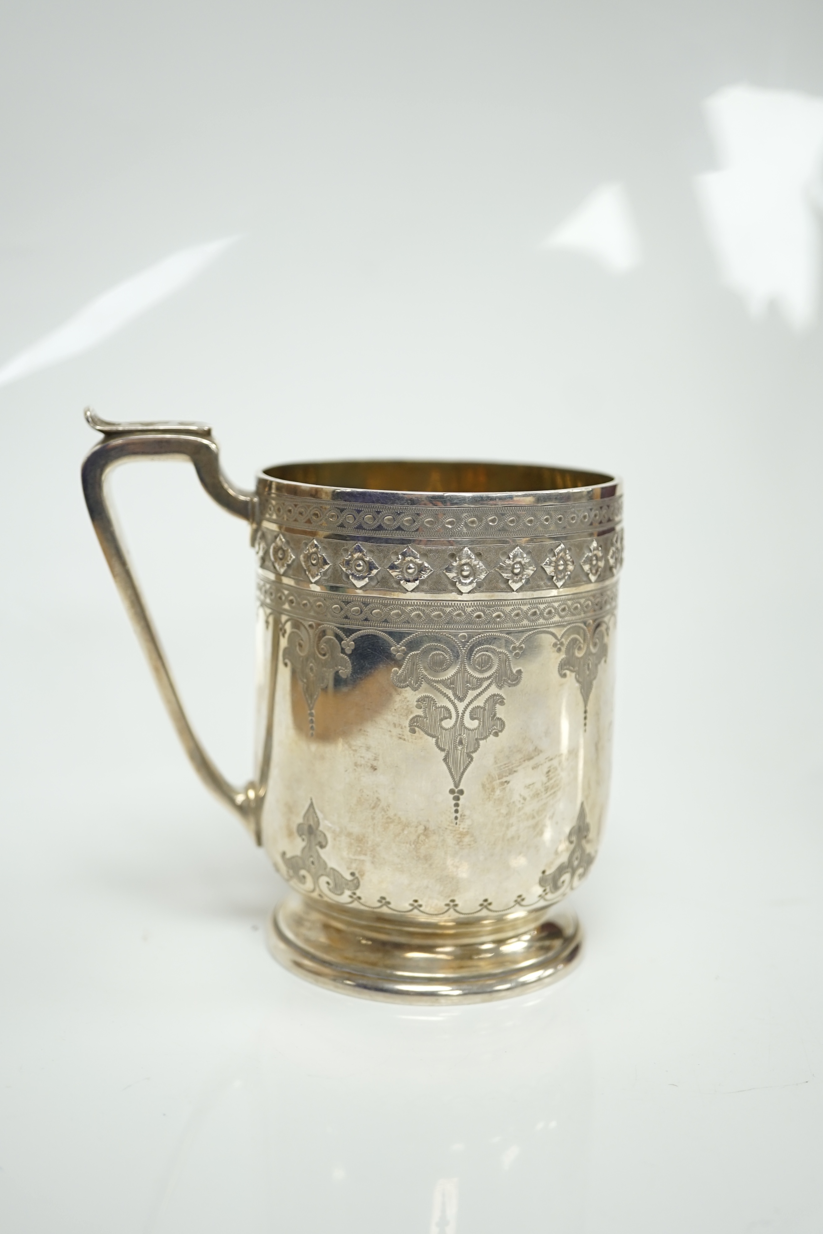 A Victorian engraved silver christening mug, Edward & John Barnard, London, 1857, 10cm, 5.7oz. Condition - fair